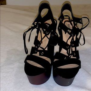 Black faux suede with faux wood platform heels